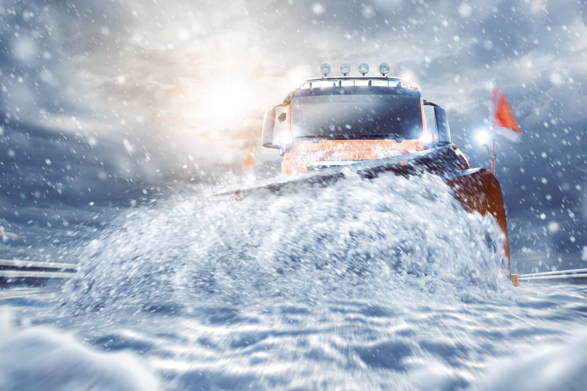 Crew plowing a driveway